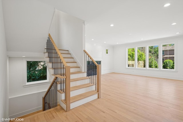 900 Pleasant Ln, Glenview, IL 60025 - staircase with wood finished floors and recessed lighting
