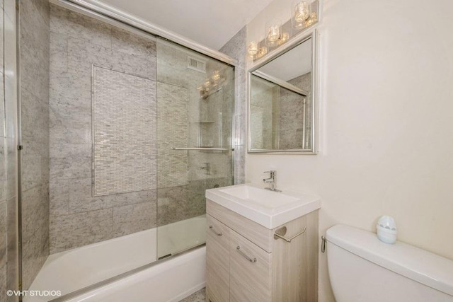 33 E Cedar St Unit 3D, Chicago, IL 60611 - full bathroom featuring bath / shower combo with glass door and vanity