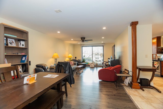 9201 Drake Ave Unit 101S, Evanston, IL 60203 - dining space featuring wood finished floors, a ceiling fan, recessed lighting, and ornate columns