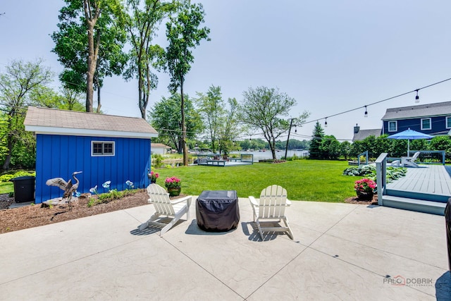908 Jackson Ave, Wauconda, IL 60084 - view of patio featuring a wooden deck and an outbuilding