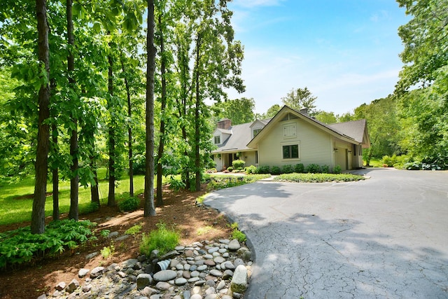 24 Robin Crest Rd, Hawthorn Woods, IL 60047 - view of side of home with driveway and an attached garage