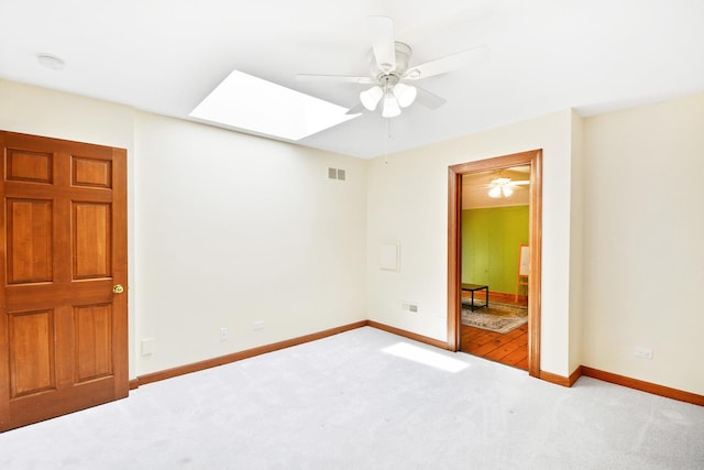 24 Robin Crest Rd, Hawthorn Woods, IL 60047 - carpeted spare room featuring ceiling fan and a skylight