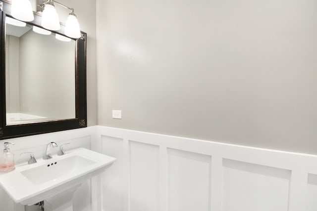 24 Robin Crest Rd, Hawthorn Woods, IL 60047 - bathroom featuring a wainscoted wall and a decorative wall
