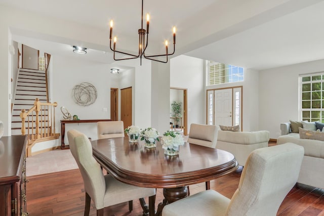 34405 N Bobolink Trl, Grayslake, IL 60030 - dining area with a chandelier, stairway, and wood finished floors