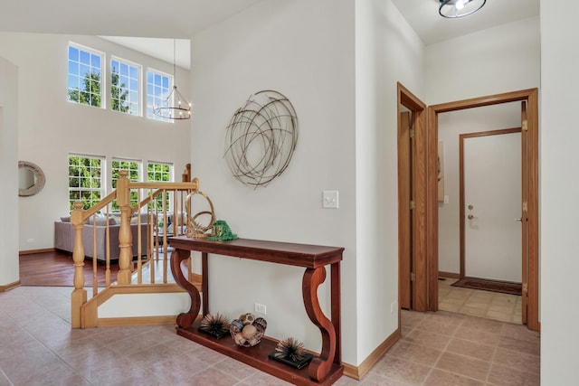 34405 N Bobolink Trl, Grayslake, IL 60030 - corridor with a chandelier, a high ceiling, and tile patterned floors