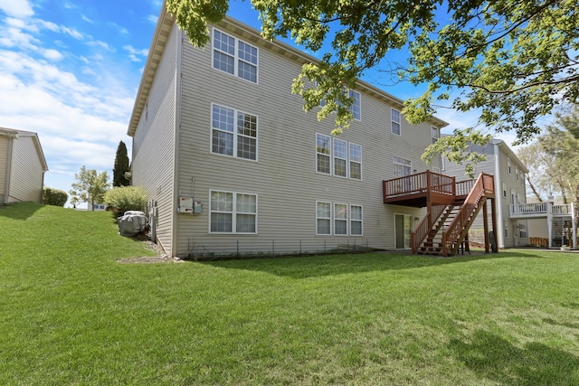 34405 N Bobolink Trl, Grayslake, IL 60030 - rear view of house with stairway, a deck, and a lawn