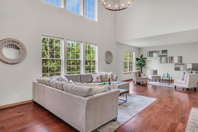 34405 N Bobolink Trl, Grayslake, IL 60030 - living area with a chandelier, dark wood-style floors, and a high ceiling