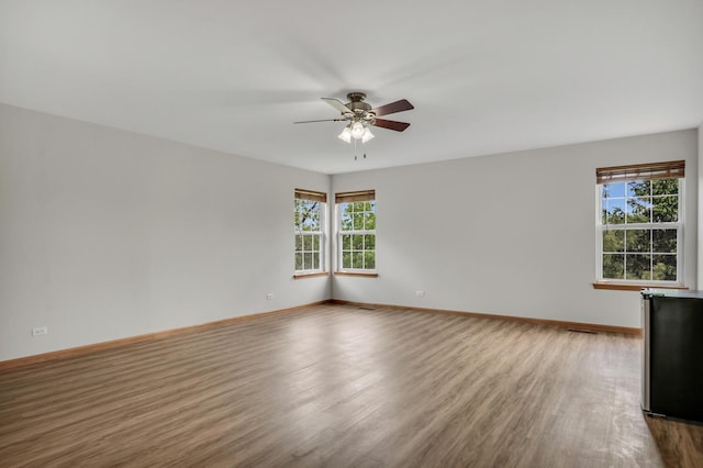 34405 N Bobolink Trl, Grayslake, IL 60030 - unfurnished room with wood finished floors and a ceiling fan