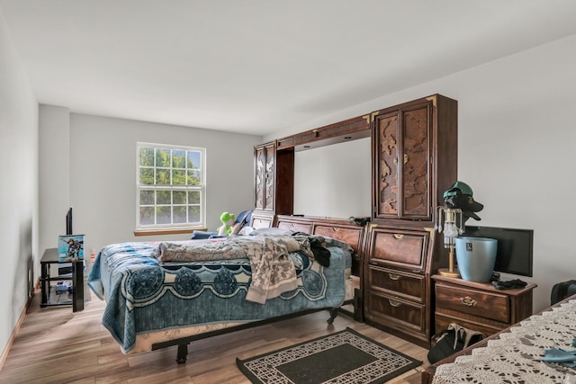 34405 N Bobolink Trl, Grayslake, IL 60030 - bedroom with light wood-style flooring and baseboards