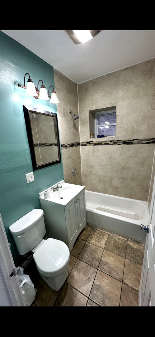 4226 W Ogden, Chicago, IL 60623 - bathroom featuring vanity and tub / shower combination