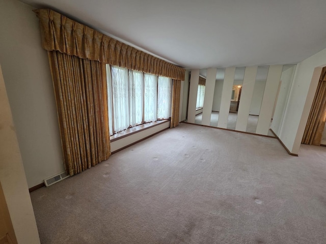 7725 Sawyer Rd, Darien, IL 60561 - unfurnished room with light colored carpet