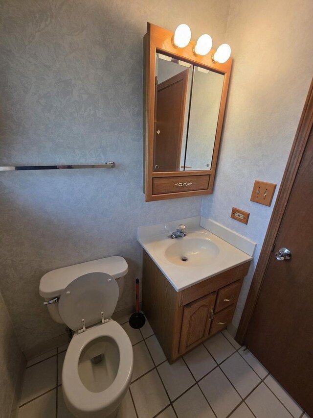 7725 Sawyer Rd, Darien, IL 60561 - bathroom with vanity and tile patterned floors