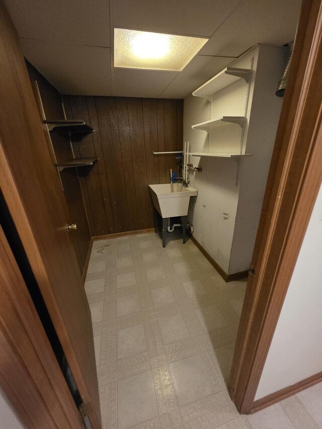 7725 Sawyer Rd, Darien, IL 60561 - laundry area with light flooring and wood walls
