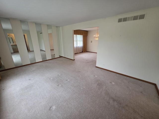 7725 Sawyer Rd, Darien, IL 60561 - empty room with a chandelier and carpet flooring