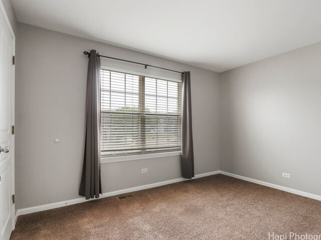 690 Savannah Ln, Crystal Lake, IL 60014 - carpeted spare room with baseboards