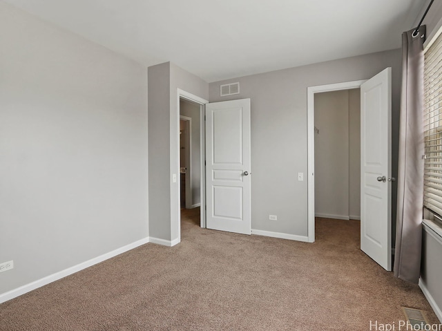 690 Savannah Ln, Crystal Lake, IL 60014 - unfurnished bedroom featuring carpet and baseboards