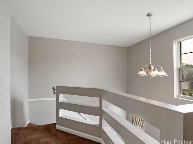 690 Savannah Ln, Crystal Lake, IL 60014 - hall featuring carpet flooring, a chandelier, and an upstairs landing