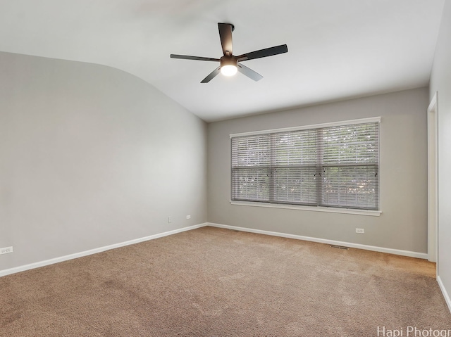 690 Savannah Ln, Crystal Lake, IL 60014 - empty room featuring a ceiling fan, vaulted ceiling, and carpet floors