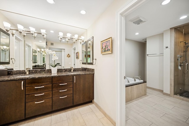 1740 Mission Hills Rd Unit 304, Northbrook, IL 60062 - full bathroom featuring a shower stall, a garden tub, double vanity, and recessed lighting