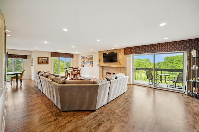1740 Mission Hills Rd Unit 304, Northbrook, IL 60062 - living area featuring wood finished floors, healthy amount of natural light, recessed lighting, and a fireplace