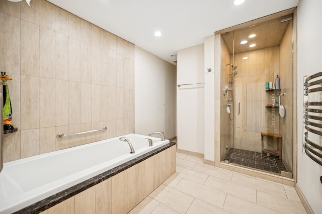 1740 Mission Hills Rd Unit 304, Northbrook, IL 60062 - full bath with a bath, a stall shower, recessed lighting, and tile patterned floors