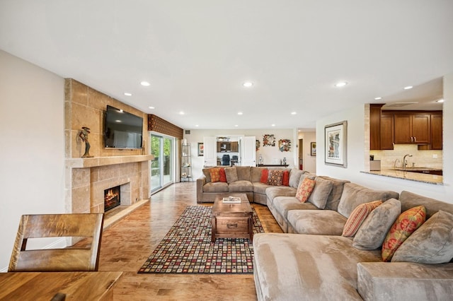 1740 Mission Hills Rd Unit 304, Northbrook, IL 60062 - living area with a fireplace, recessed lighting, and light wood-type flooring