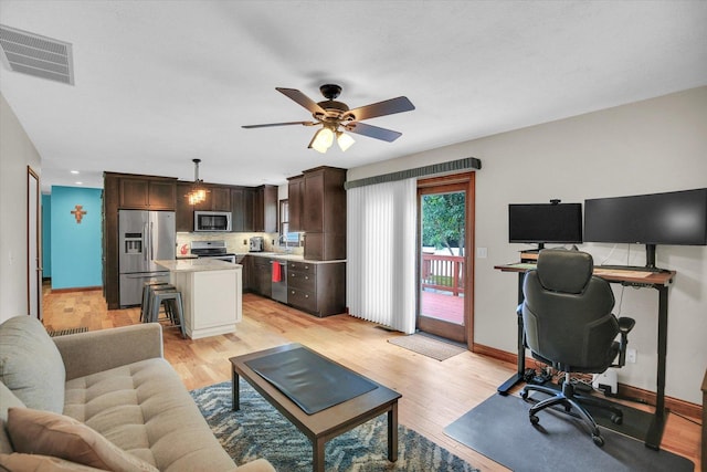 3204 Fawn Hill Ct, Urbana, IL 61802 - living area with an office area, ceiling fan, and light wood-type flooring