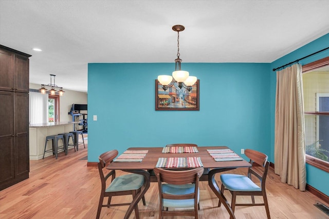3204 Fawn Hill Ct, Urbana, IL 61802 - dining room featuring a chandelier, light wood-style floors, and recessed lighting