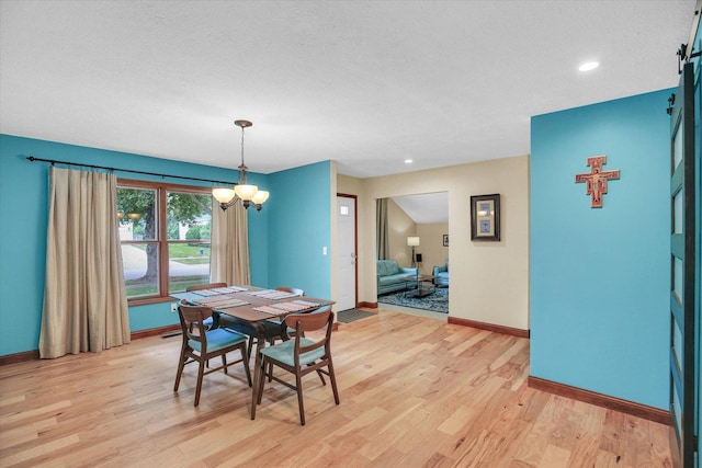 3204 Fawn Hill Ct, Urbana, IL 61802 - dining area featuring light wood-type flooring, a chandelier, and recessed lighting