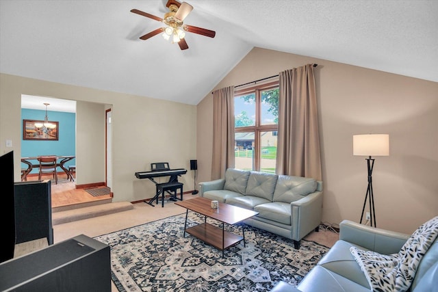 3204 Fawn Hill Ct, Urbana, IL 61802 - living area with a chandelier, lofted ceiling, ceiling fan, and carpet flooring