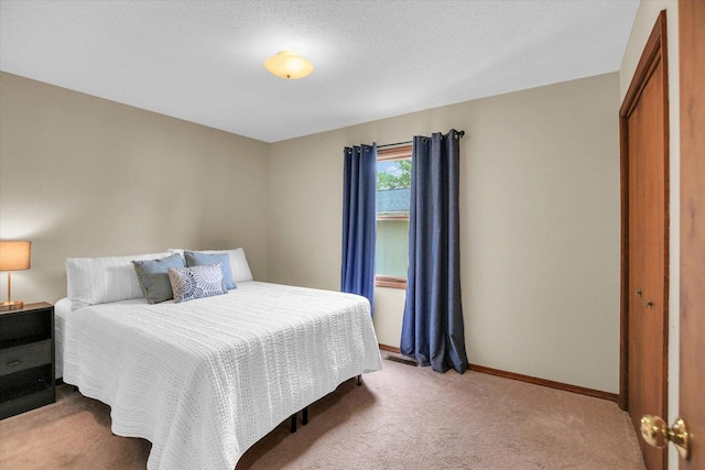 3204 Fawn Hill Ct, Urbana, IL 61802 - bedroom featuring light colored carpet and a closet