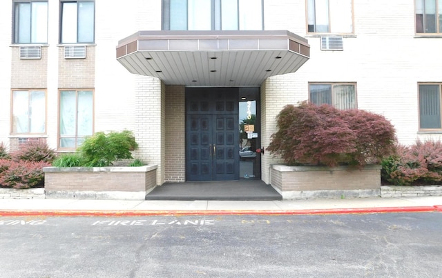 9740 S Pulaski Rd Unit 107, Oak Lawn, IL 60453 - entrance to property featuring brick siding and french doors