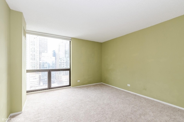 70 W Huron St Unit 2202, Chicago, IL 60654 - carpeted spare room with healthy amount of natural light