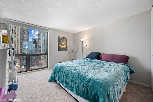 70 W Huron St Unit 2202, Chicago, IL 60654 - carpeted bedroom with a view of city and a textured ceiling