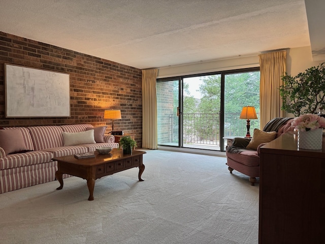 825 Pearson St Unit 3A, Des Plaines, IL 60016 - carpeted living area with brick wall and a textured ceiling