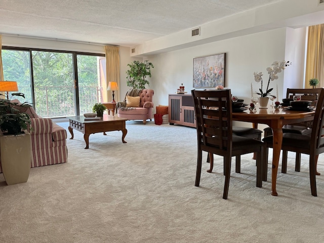 825 Pearson St Unit 3A, Des Plaines, IL 60016 - carpeted dining space featuring a textured ceiling