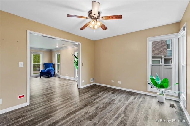 200 Ambria Dr, Mundelein, IL 60060 - unfurnished room featuring wood finished floors, ceiling fan, and ornamental molding