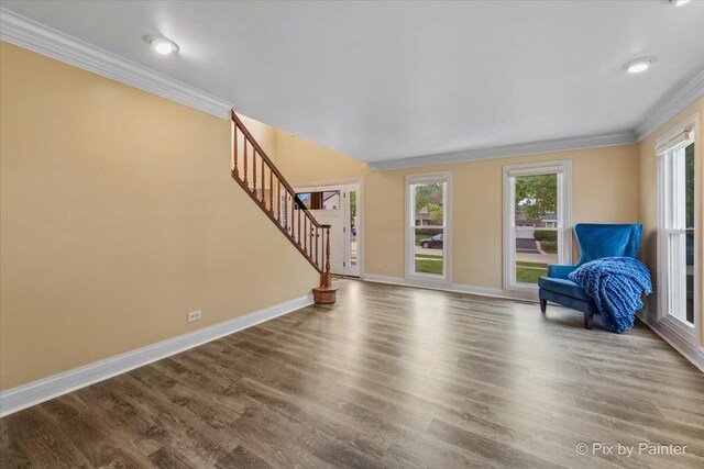 200 Ambria Dr, Mundelein, IL 60060 - unfurnished room featuring ornamental molding, stairway, and wood finished floors
