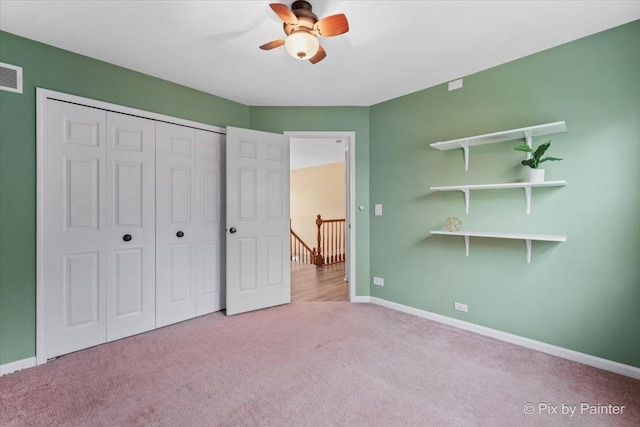 200 Ambria Dr, Mundelein, IL 60060 - unfurnished bedroom with carpet, a closet, and ceiling fan