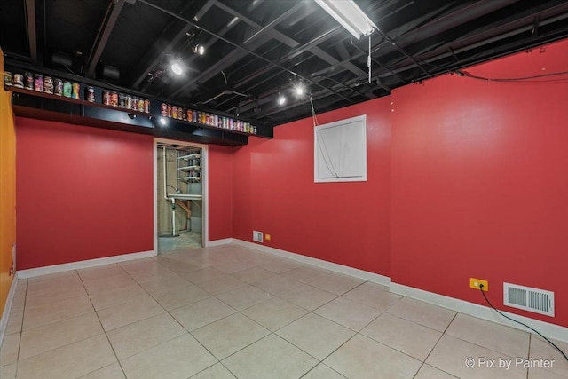 200 Ambria Dr, Mundelein, IL 60060 - finished basement with baseboards and tile patterned flooring