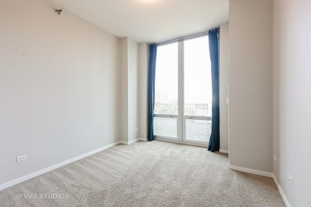 1600 S Indiana Ave Unit 508, Chicago, IL 60616 - carpeted empty room with baseboards