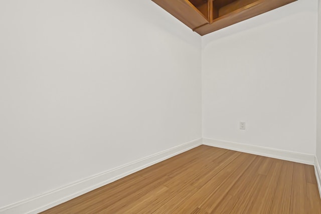 340 E Randolph St Unit 404, Chicago, IL 60601 - unfurnished room with baseboards and light wood-style floors