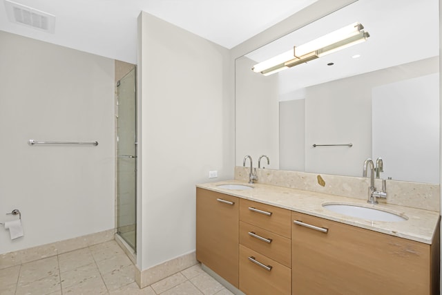 340 E Randolph St Unit 404, Chicago, IL 60601 - bathroom featuring double vanity, tile patterned flooring, and an enclosed shower