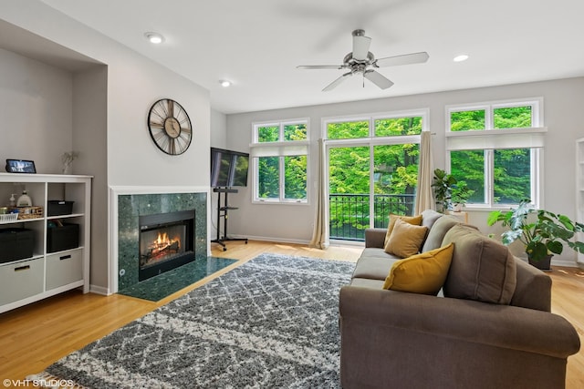 5414 S Greenwood Ave Unit 2, Chicago, IL 60615 - living room featuring plenty of natural light, a ceiling fan, a fireplace, wood finished floors, and recessed lighting