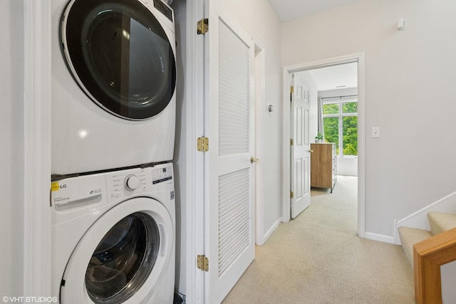 5414 S Greenwood Ave Unit 2, Chicago, IL 60615 - laundry room with stacked washing machine and dryer and light carpet