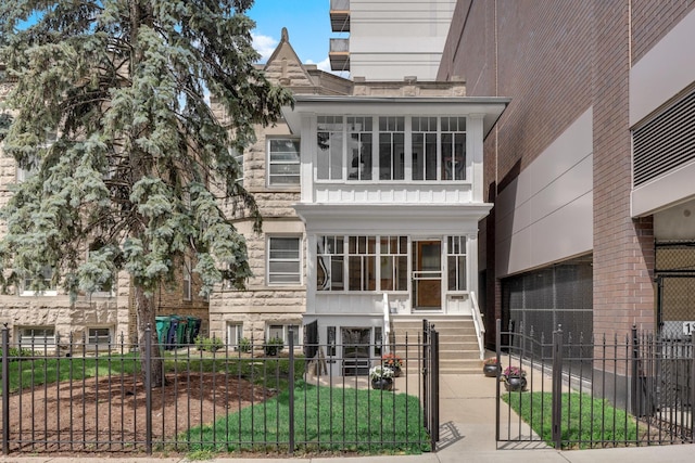 109 S Maple Ave, Oak Park, IL 60302 - view of front facade with a fenced front yard and stone siding