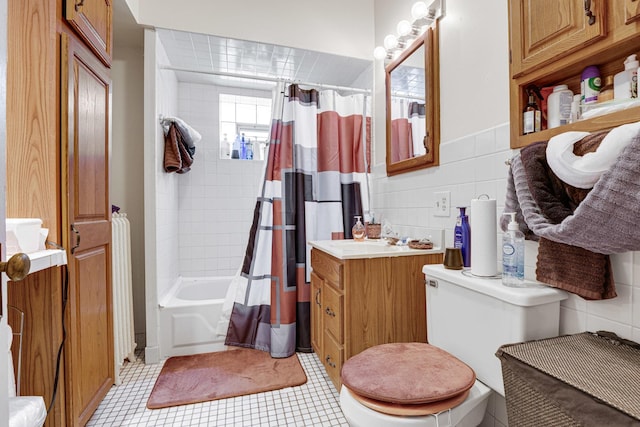 109 S Maple Ave, Oak Park, IL 60302 - full bath featuring vanity, tile walls, shower / tub combo with curtain, and tile patterned floors