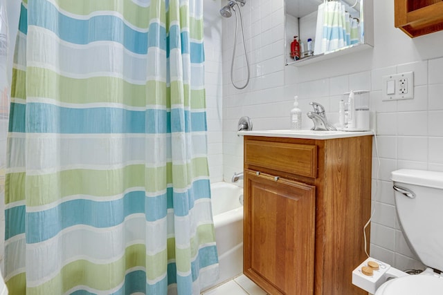 109 S Maple Ave, Oak Park, IL 60302 - bathroom with tile walls, vanity, and shower / tub combo