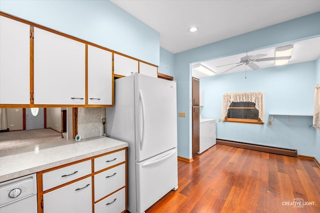 92 Maple St, Sugar Grove, IL 60554 - kitchen featuring freestanding refrigerator, a baseboard radiator, washer / clothes dryer, a ceiling fan, and light countertops