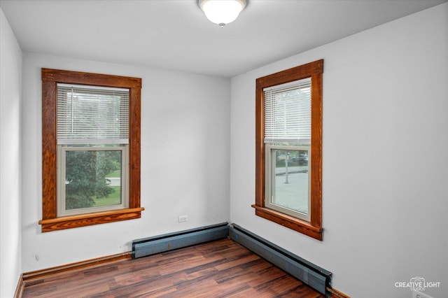 92 Maple St, Sugar Grove, IL 60554 - empty room with dark wood-type flooring and baseboard heating